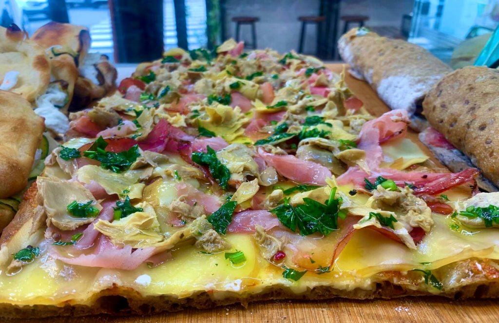 A Roma c’è chi vive la vita un quarto di pizza alla volta