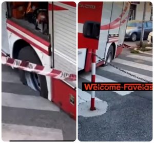 Camion dei pompieri sprofonda con una ruota in una voragine